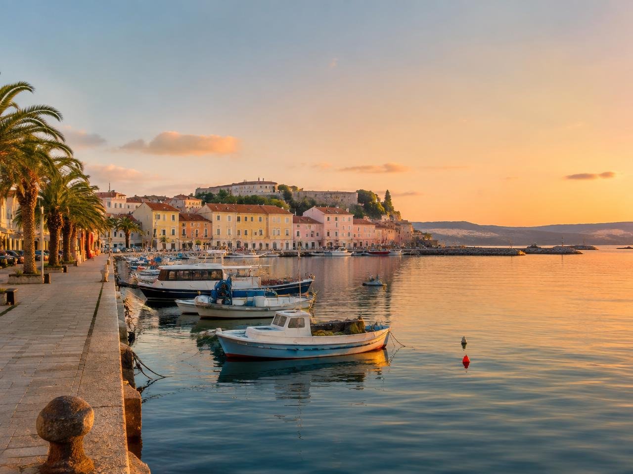 Harbour of a nearby coastal town at sunset
